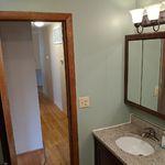 Hallbath has a granite countertop for the vanity and is conveniently located for both guests and resident use.