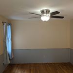 Dining room has a ceiling fan (like most of the rooms) and it is large enough for a nice-sized table.