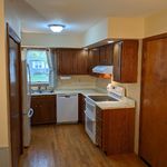 View of kitchen (looking west).  Large enough to hold two or three people working but not so large that travel time from one station to another slows you down while you are making your culinary masterpieces.  A Bosch dishwasher is in the distance.