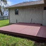 Backyard has a large deck for entertaining.