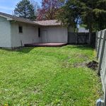 Large fenced back yard.