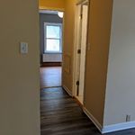 Hallway leading to bathroom and bedroom.