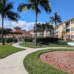Wonderfully landscaped grounds with walking paths for your enjoyment.  Multiple fountains.  It really does feel like you are living in a resort!

Looking South.